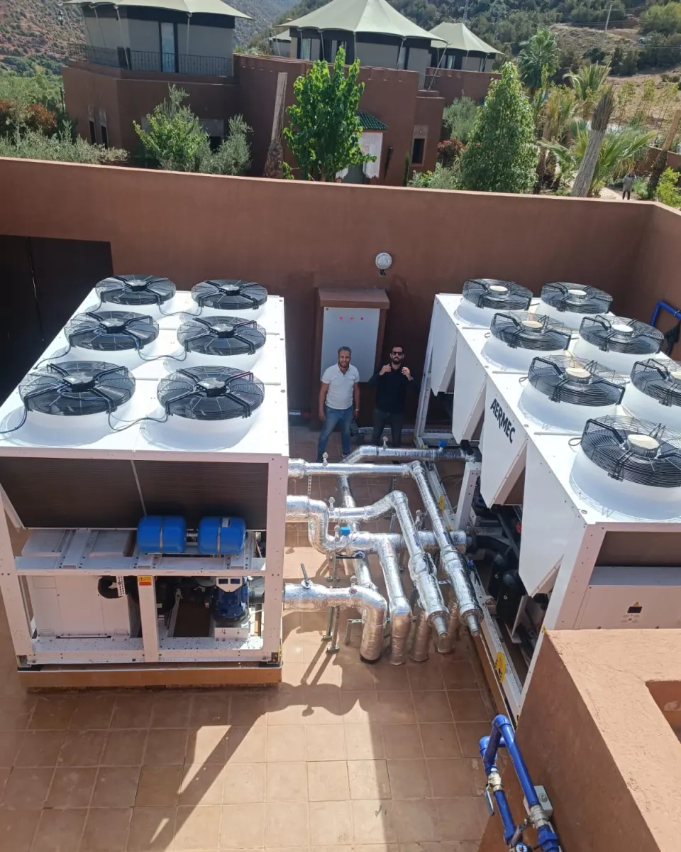 Aermec units and insulated hydraulic pipework installed on a rooftop